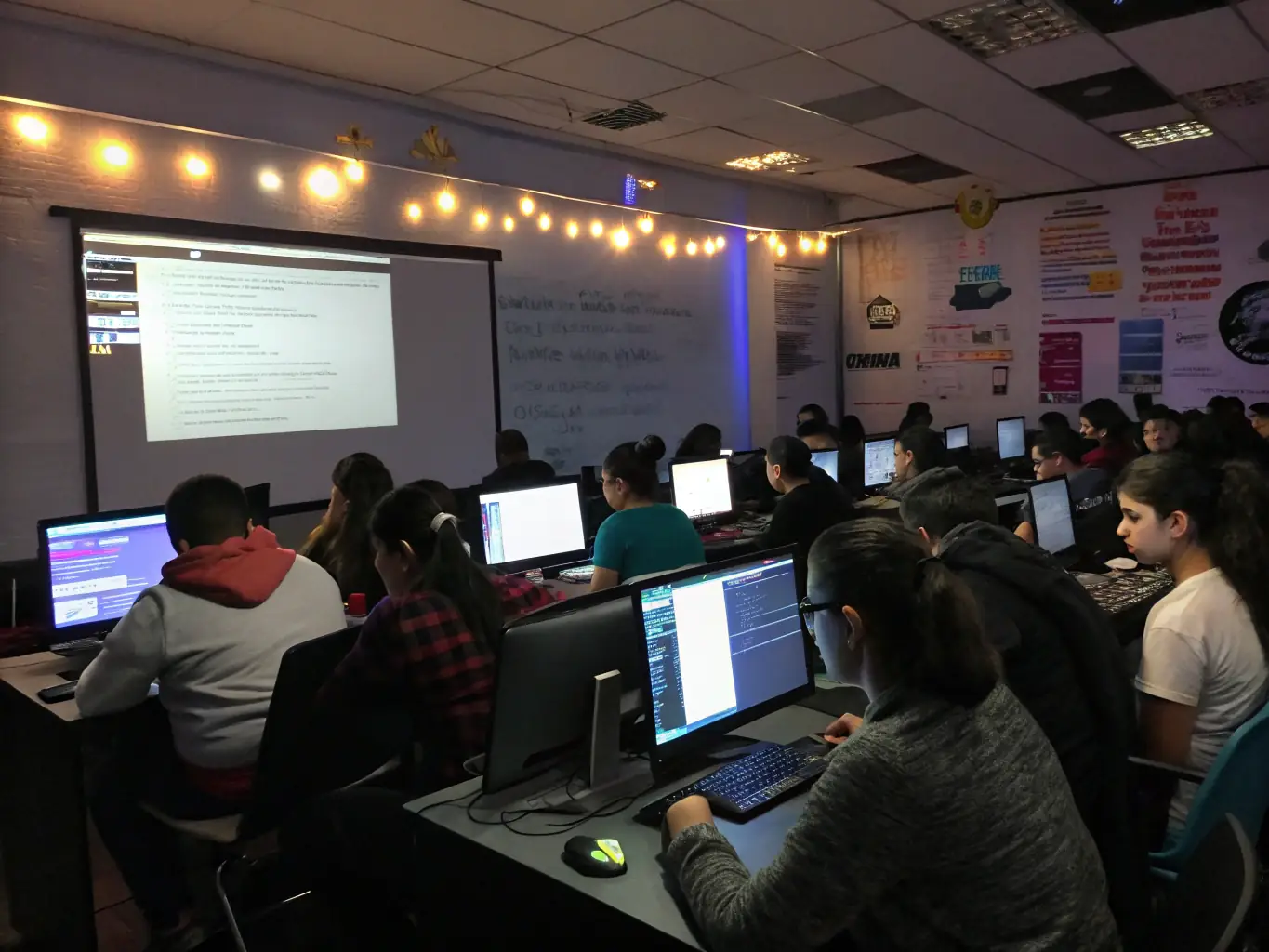 A classroom setting with students actively participating in a machine learning workshop, focusing on hands-on coding and algorithm development.